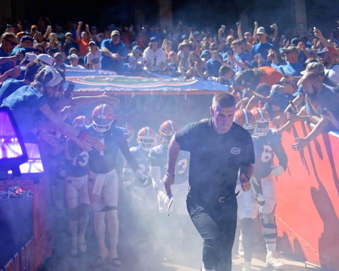 Florida Gators head Billy Napier leads the Gators out of the tunnel- 1280x1024