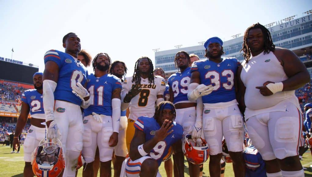 Florida Gators players celebrate with their old teammate, Mizzou Tigers linebacker Ty'Ron Hopper #8, after the Gators win over the Tigers on October 6th, 2022. (Gator Country/Sammy Harrison)- 1280x936