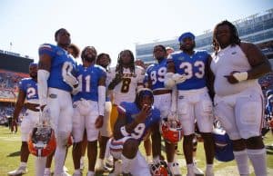 Florida Gators players celebrate with their old teammate, Mizzou Tigers linebacker Ty'Ron Hopper #8, after the Gators win over the Tigers on October 6th, 2022. (Gator Country/Sammy Harrison)- 1280x936
