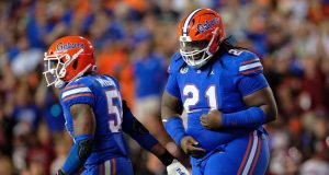 Florida Gators defensive lineman Desmond Watson recovers a fumble against South Carolina- 1280x853