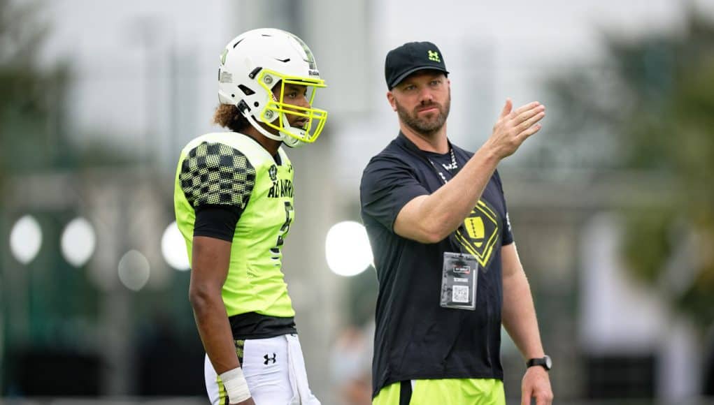 Florida Gators Football signee quarterback Jaden Rashada talks with his Team Speed coach-1280x853