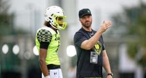 Florida Gators Football signee quarterback Jaden Rashada talks with his Team Speed coach-1280x853