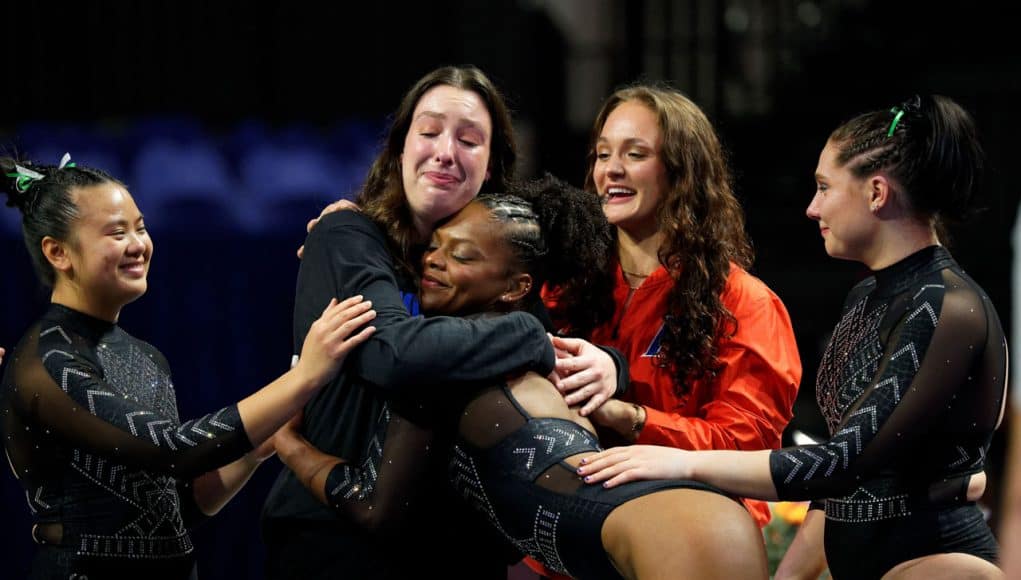 The #3 Florida Gators gymnastics team celebrates winning their 5th straight SEC title- 1280x853