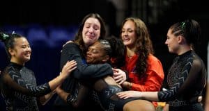 The #3 Florida Gators gymnastics team celebrates winning their 5th straight SEC title- 1280x853