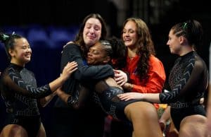 The #3 Florida Gators gymnastics team celebrates winning their 5th straight SEC title- 1280x853