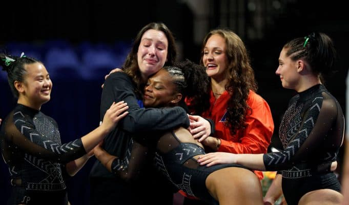 The #3 Florida Gators gymnastics team celebrates winning their 5th straight SEC title- 1280x853