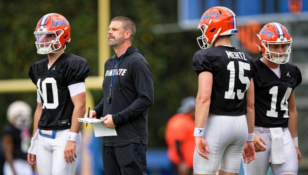 Florida Gators head coach Billy Napier with the quarterbacks during spring practice- 1280x853