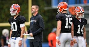 Florida Gators head coach Billy Napier with the quarterbacks during spring practice- 1280x853