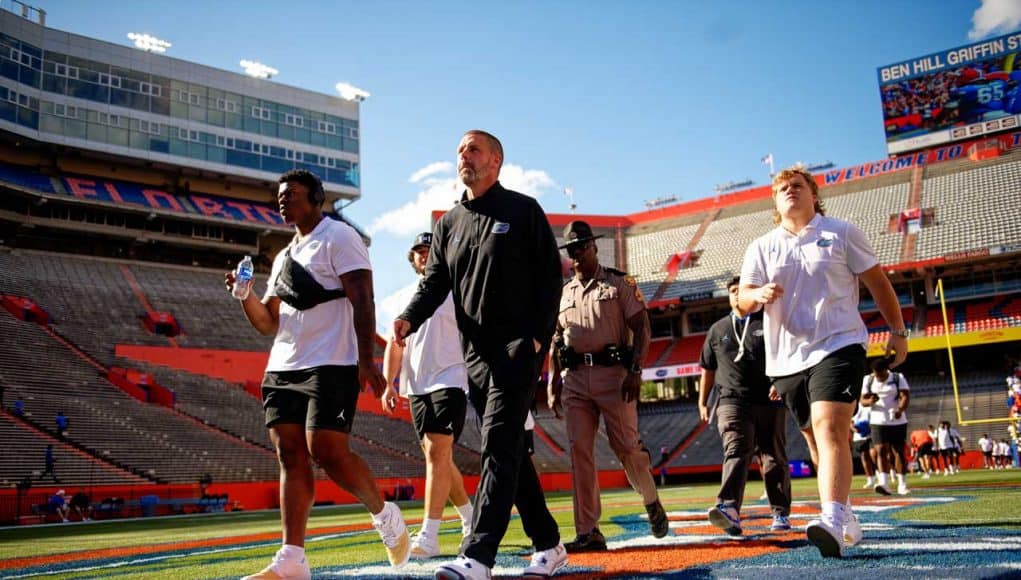 Florida Gators football head coach Billy Napier and the Gators walk into Ben Hill Griffin Stadium as they get ready for the 2023 Orange and Blue Game- 1280x853