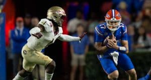Florida Gators quarterback Max Brown runs against Florida State- 1280x853