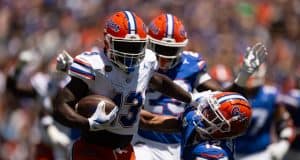 Running back Jadan Baugh runs in the Orange and Blue game- 1280x853