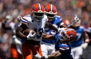 Running back Jadan Baugh runs in the Orange and Blue game- 1280x853