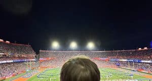 A child watches a halftime show at the Swamp, September 7, 2024