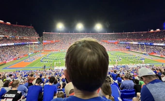 A child watches a halftime show at the Swamp, September 7, 2024