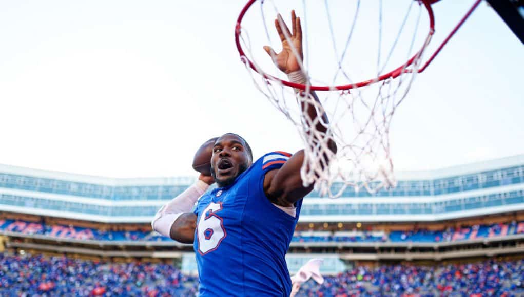 Linebacker Shemar James celebrates the win over Ole Miss by dunking the football-1280x853