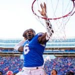 Linebacker Shemar James celebrates the win over Ole Miss by dunking the football-1280x853