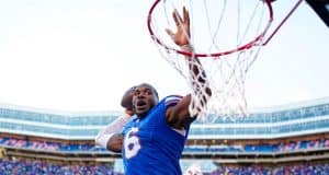 Linebacker Shemar James celebrates the win over Ole Miss by dunking the football-1280x853