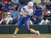 Florida Gators right fielder Taylor Shumaker hits against Texas- 1280x853