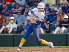 Florida Gators right fielder Taylor Shumaker hits against Texas- 1280x853